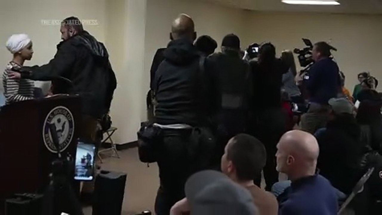 Man tackled after spraying unknown substance on Rep. Ilhan Omar at town hall in Minneapolis