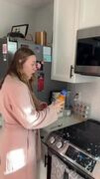 Creamer Spills and Splatters While Woman Shakes Bottle
