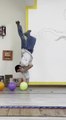 One Handed Balloon Popping Handstand Challenge