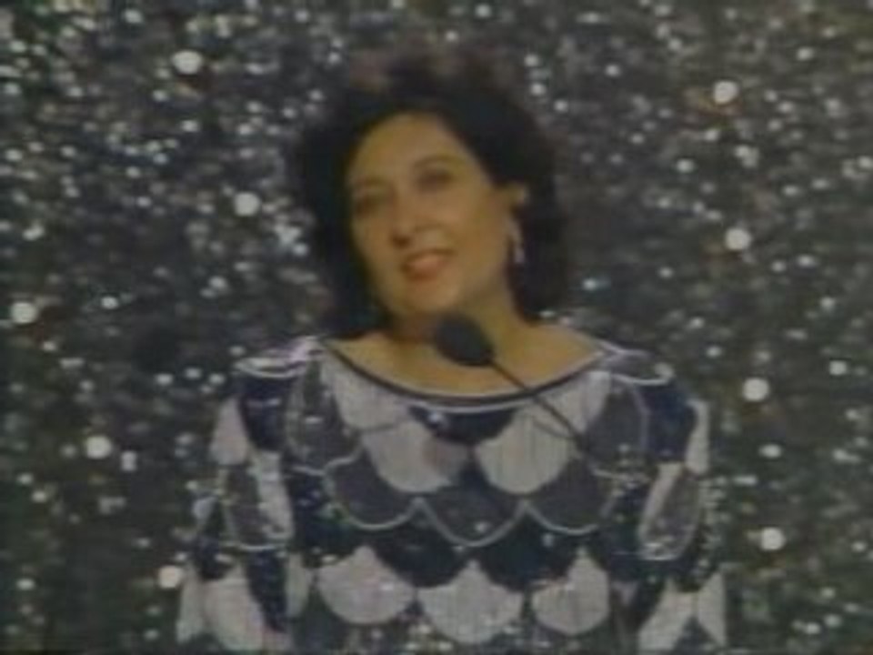 JOAN COLLINS PRESENTING EMMY AWARDS