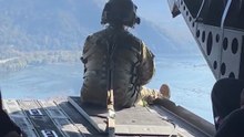 Why Chinook Crew Sit at the Open Door?