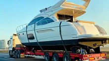 The man was filming his yacht being transported when the truck carrying it failed