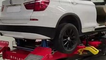 BMW X3 repaired on a Celette frame machine, using our universal Cameleon jigset for precise alignment.