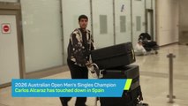 Australian Open champion Carlos Alcaraz returns to Spain
