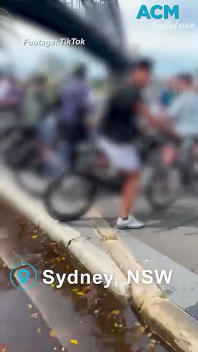 'E-hooning' outrage as e-bike gang storms Sydney Harbour Bridge