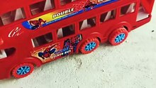 Red bus & yellow JCB
