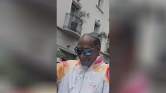 JO d'hiver - Snoop Dogg porte la torche olympique