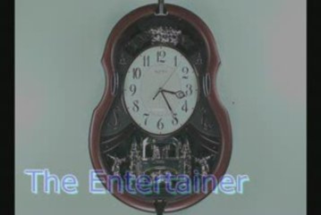 Viola Entertainer Musical Clock by Rhythm Clocks