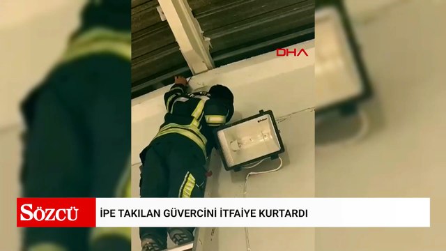 İpe takılan güvercini itfaiye kurtardı