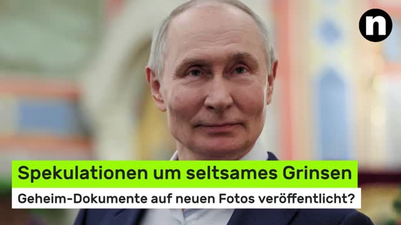 Wladimir Putin: Spekulationen um seltsames Grinsen - Geheim-Dokumente auf neuen Fotos veröffentlicht?