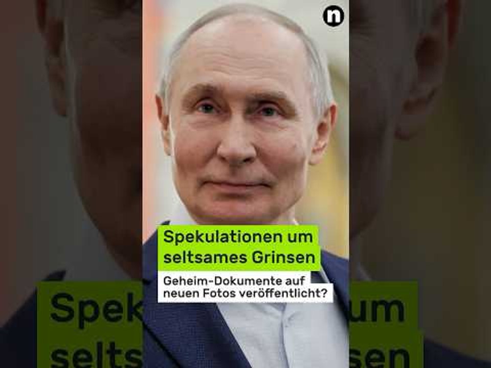 Wladimir Putin: Spekulation um seltsames Grinsen - Geheim-Dokumente auf neuen Fotos veröffentlicht?