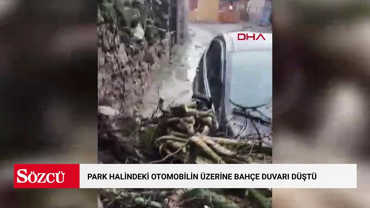 Park halindeki otomobilin üzerine bahçe duvarı düştü