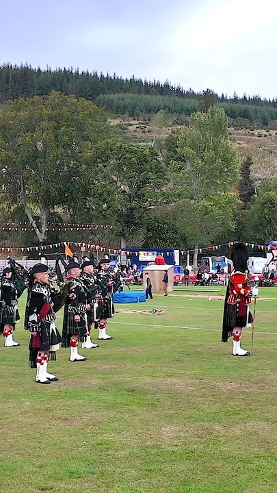 The Lonach Pipe Band_ led by Drum Major Neil Jamieson and Pipe Major Michael Laing_ as they march off playing the Pibroch o_ Donal Dhu. This concluded Beatin