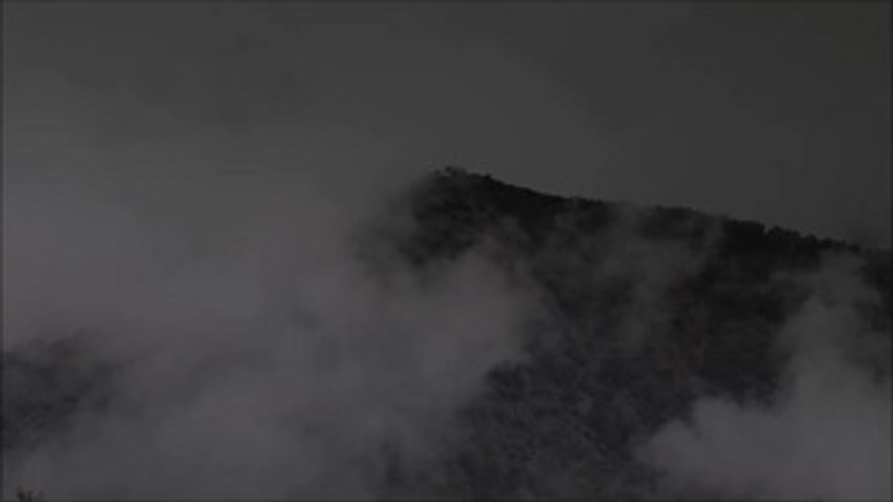 Mountains With Rolling Clouds