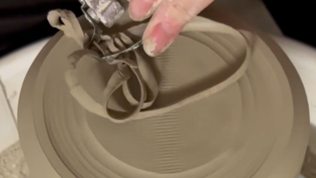 Craftsman Perfectly Shapes the Base of a Stoneware Lamp for an Immaculate Look