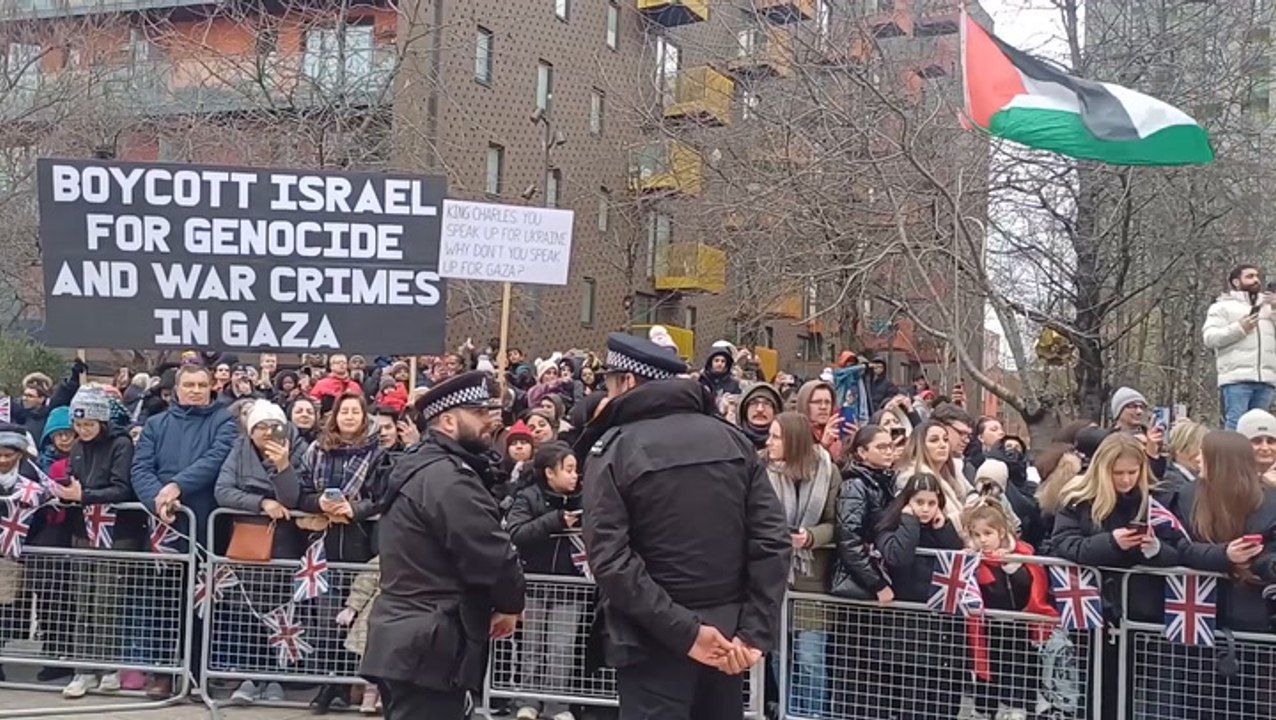 Pro-Palestine protesters’ chants drowned out by crowds during King’s visit to London’s East End