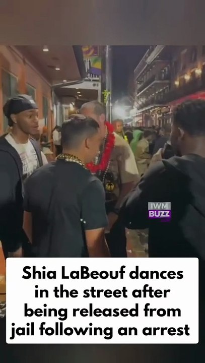 Hollywood actor Shia LaBeouf dances in the street after being released from jail following an arrest linked to a Mardi Gras incident
