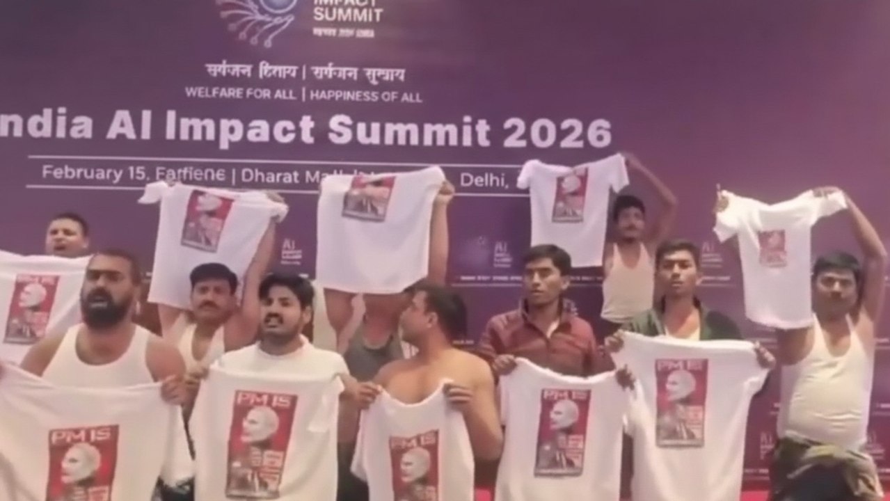 Video: Youth Congress workers protest shirtless at AI Summit against PM