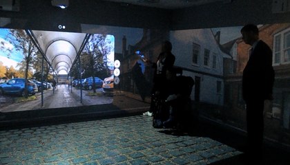 Government minister Sir Stephen Timms views one of the disabled access videos prepared by Treloar's