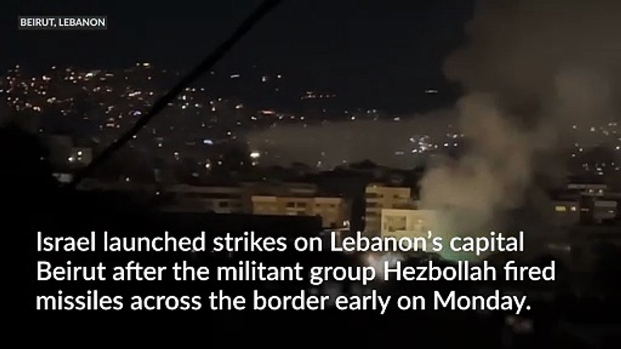 Israel launches strikes on Beirut after Hezbollah fires missiles across border