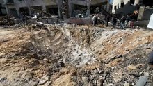 Tel Aviv residents assess damage after Iranian missile strike kills one