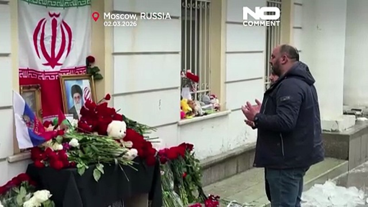 People lay flowers at makeshift Khamenei memorial in Moscow