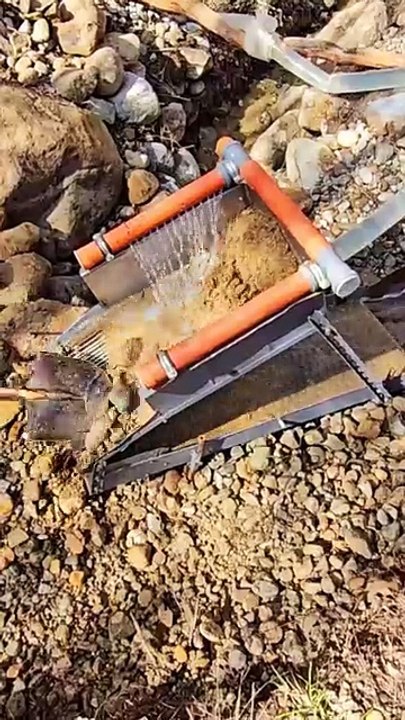 I tried gold mining using a small sluice box , and here are the results!.