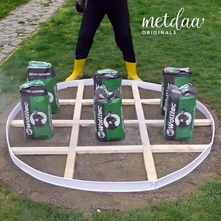 Creating a circular concrete patio through dry pour method