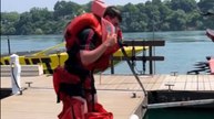 Man jumps into the water wearing 16 life jackets *Hilarious Video*