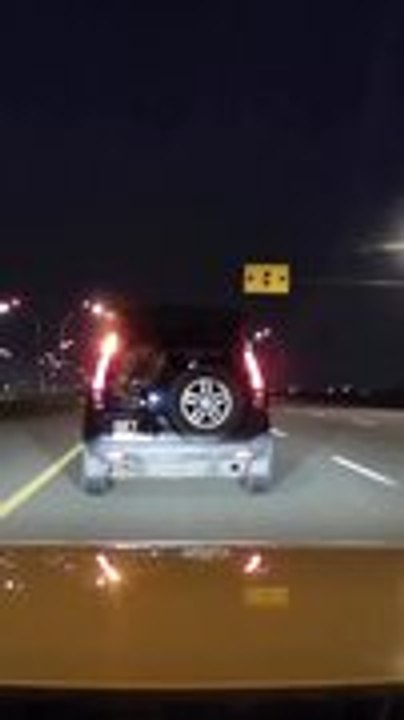 Man Drops Camera from Moving Car