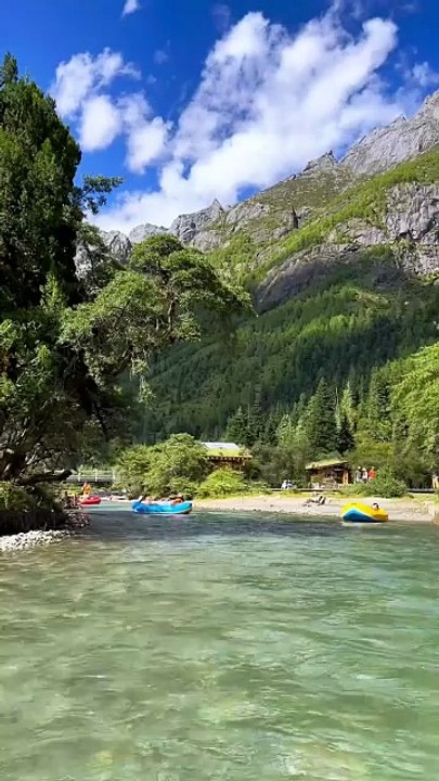 Kayaking in a Crystal Clear Mountain River
