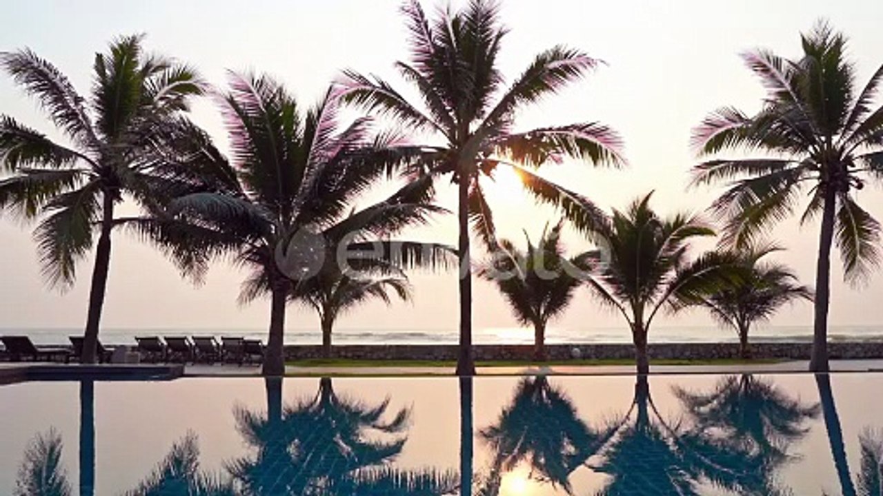 Beautiful Sunny Morning in Tropical Resort, Swimming Pool and Trees on Beach, Full Frame