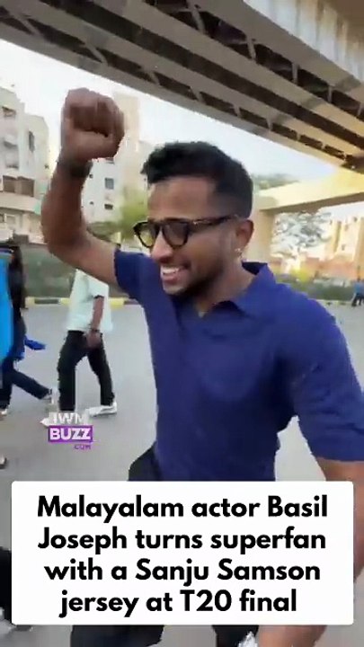 Malayalam actor Basil Joseph turns superfan with a Sanju Samson jersey at the T20 World Cup final in Ahmedabad, accompanied by Mollywood director Ananth