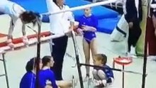 Young Gymnast Loses Grip on the Bar and Falls During Competition