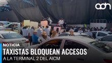 Taxistas bloquean acceso a terminal 2 del AICM y terminan enfrentando a la policía