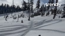 High-Speed Snowmobile Launch Sends Rider Flying Across Snow