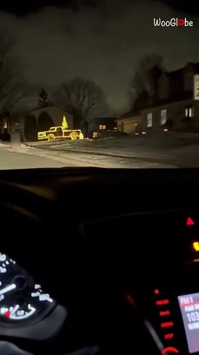 Christmas lights and a glowing tree transform an ordinary truck into a festive spectacle
