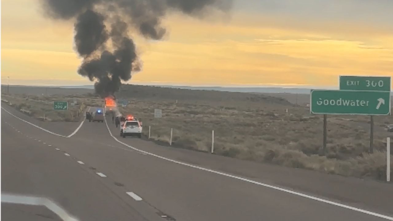 Burning travel trailer spotted by car driver on Interstate 40 in Arizona