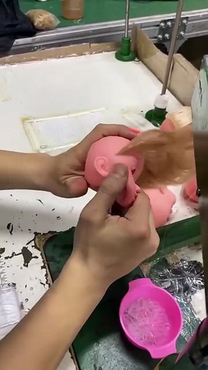Showing how doll heads get their hair