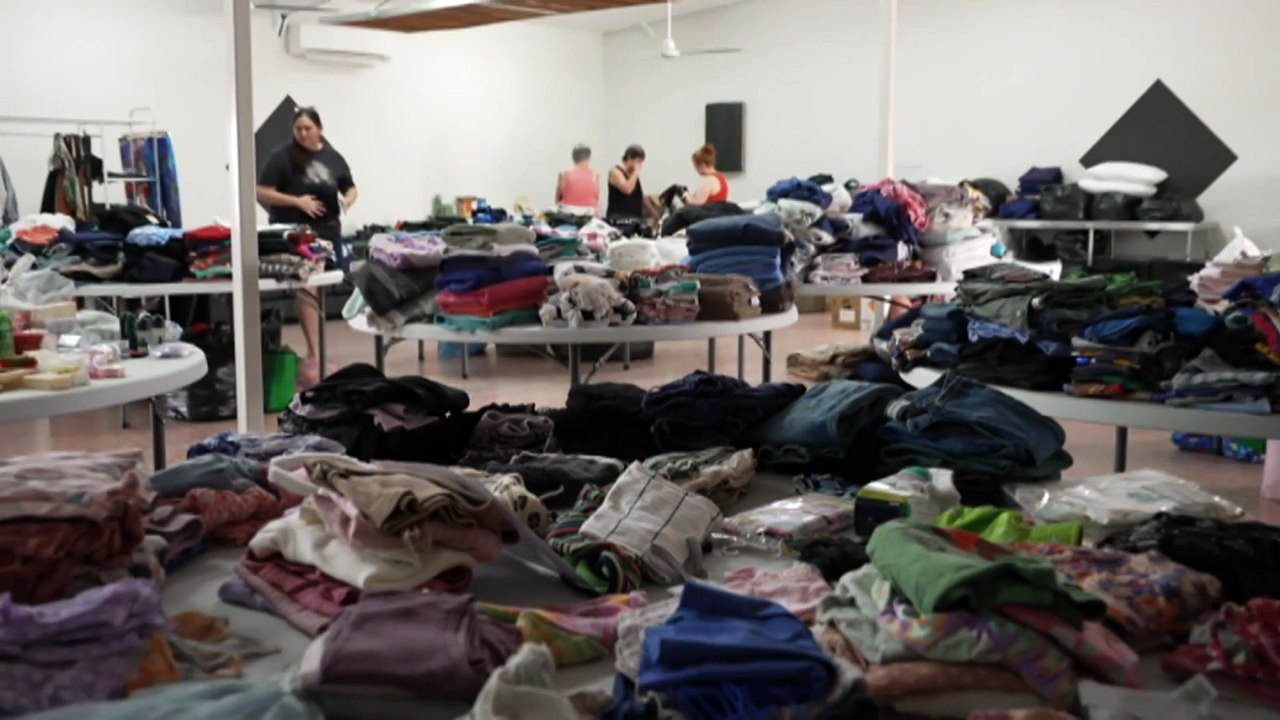 Floodwaters reach roof height in remote NT community, as clean-up begins elsewhere