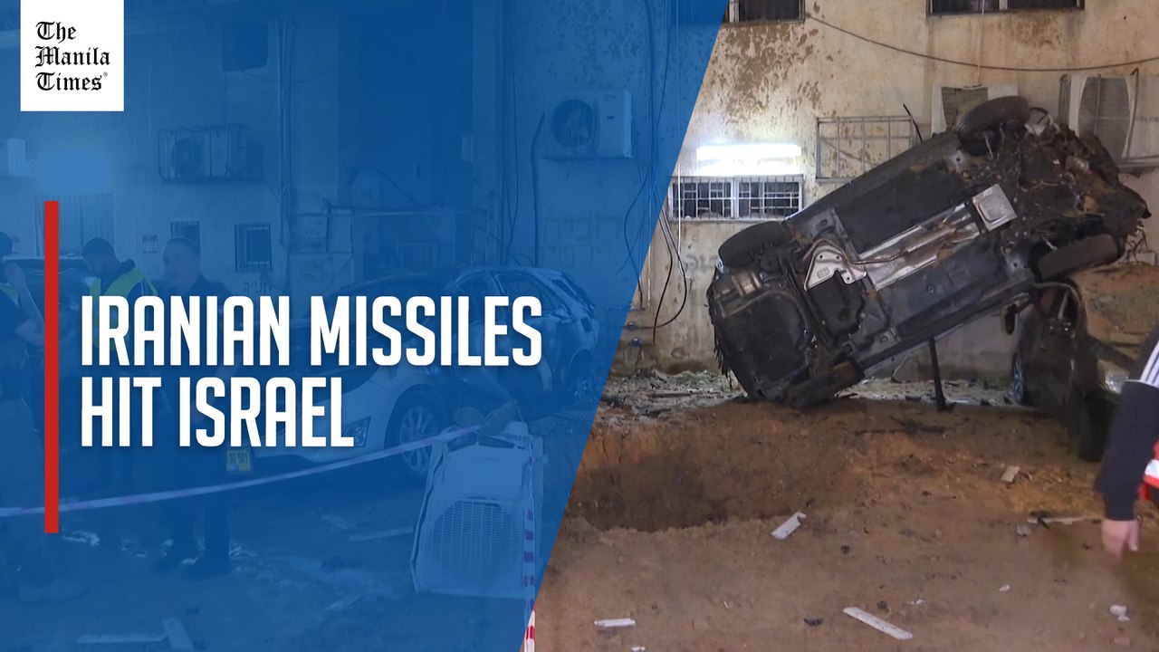 Cars burned, overturned by shrapnel of Iranian missiles in central Israel