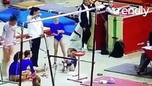 Young Gymnast Loses Grip on Bar During Contest and Falls