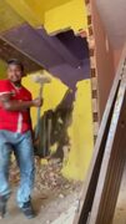 Whole Wall Unexpectedly Collapses While Man Is Breaking It