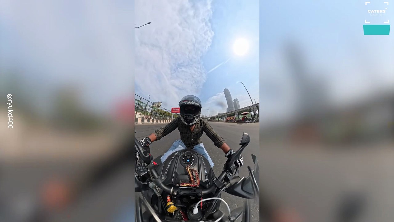 Bike Collides With Car in Sudden Road Accident Caught on Camera