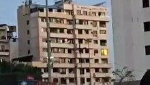 A building collapses in Beirut, Lebanon, after being bombed by Israel.