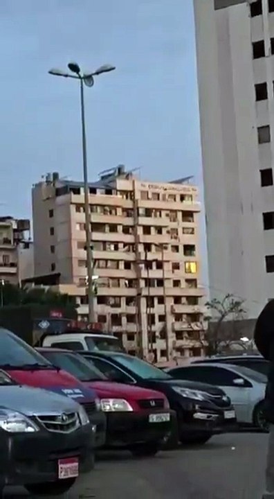A building collapses in Beirut, Lebanon, after being bombed by Israel.