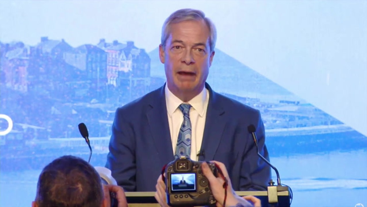 Farage tells heckler ‘get a haircut’ after protesters disrupt Reform conference