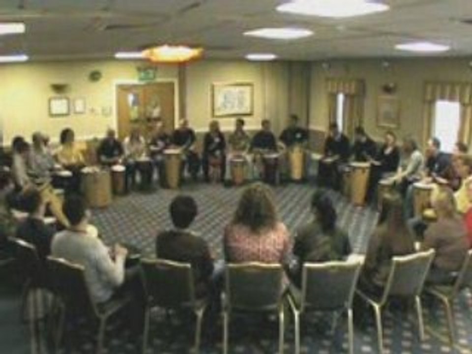 Team building drumming circle workshop