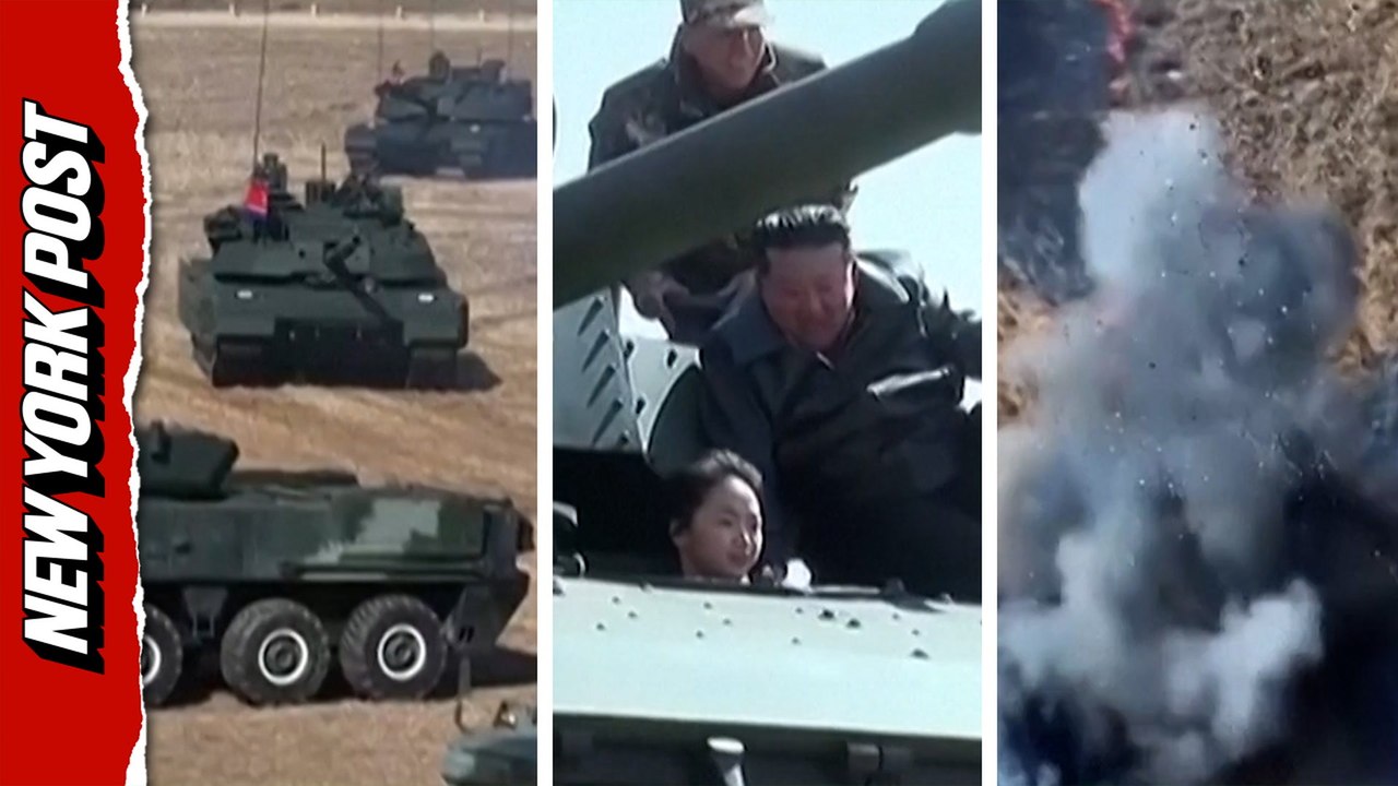 See Kim Jong Un and daughter ride a tank as they oversee military drills