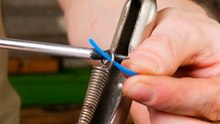 Tension Made Simple 🛠️How to Stretch a Spring with Pliers!